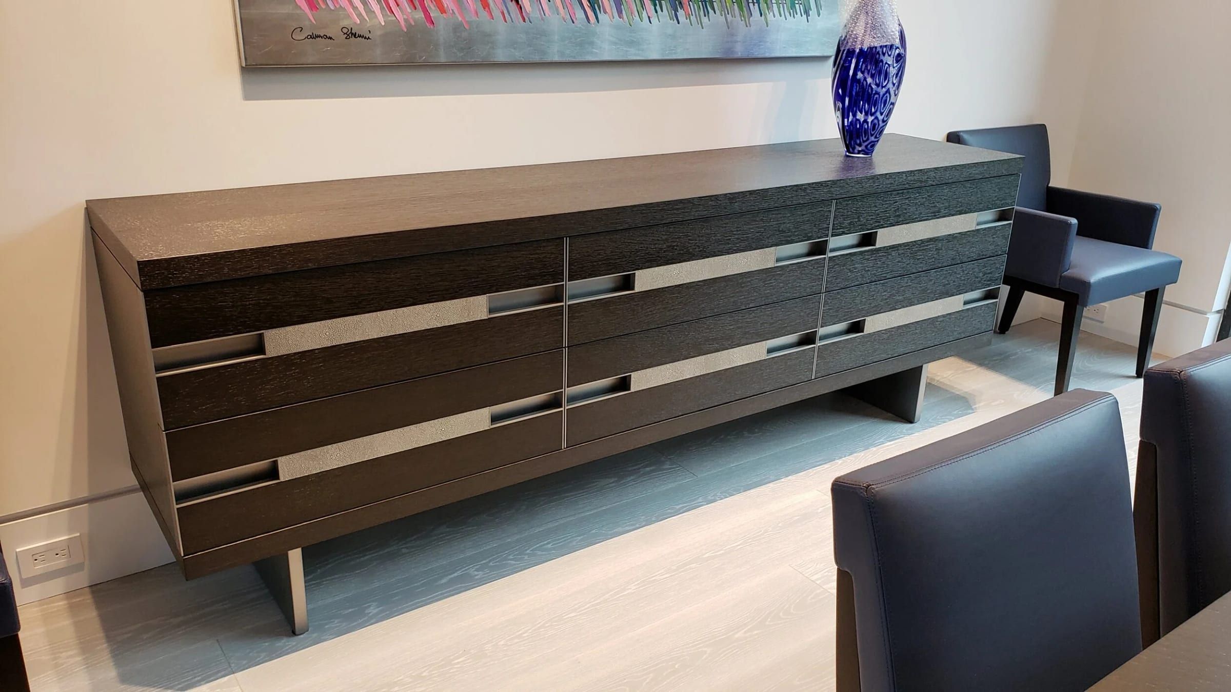 Long credenza with inset metal pull channels
