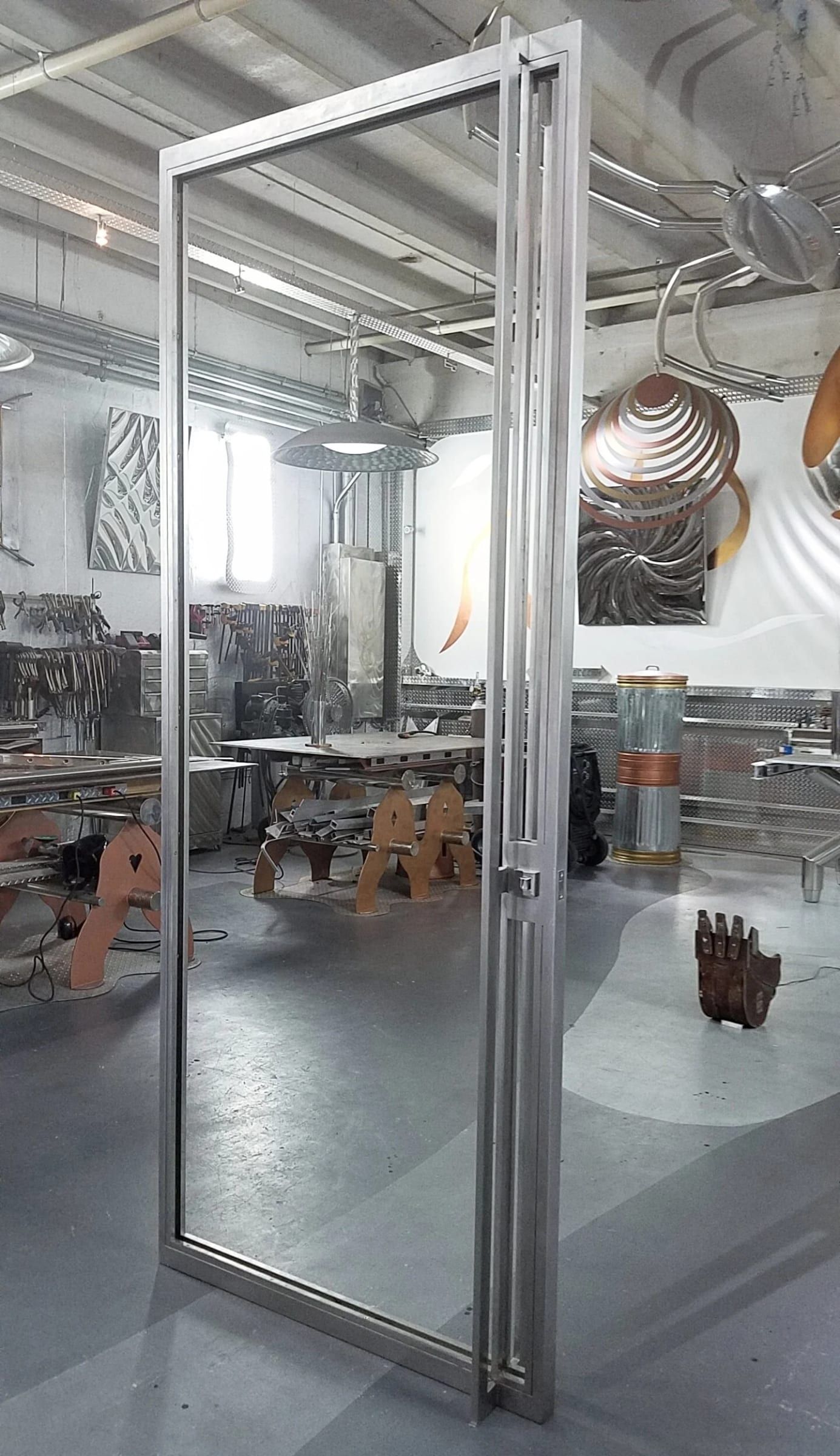 Glass door in a slim stainless steel frame